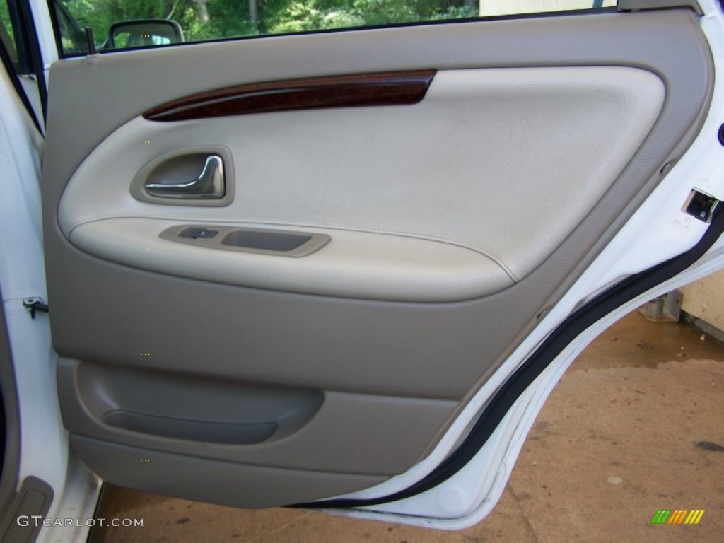 2002 Volvo S40 1.9T Taupe/Light Taupe Door Panel Photo #50603811
