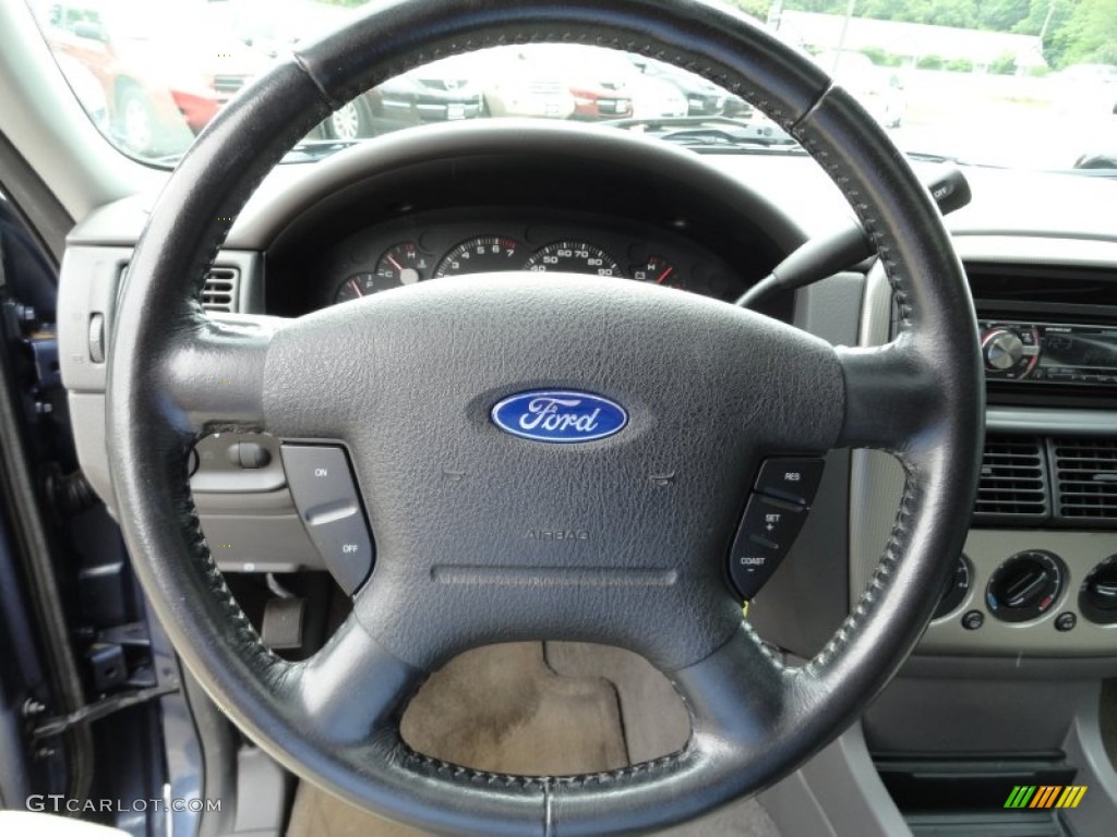 2004 Explorer XLT 4x4 - Dark Blue Pearl Metallic / Graphite photo #25