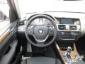 Black 2011 BMW X3 xDrive 35i Dashboard