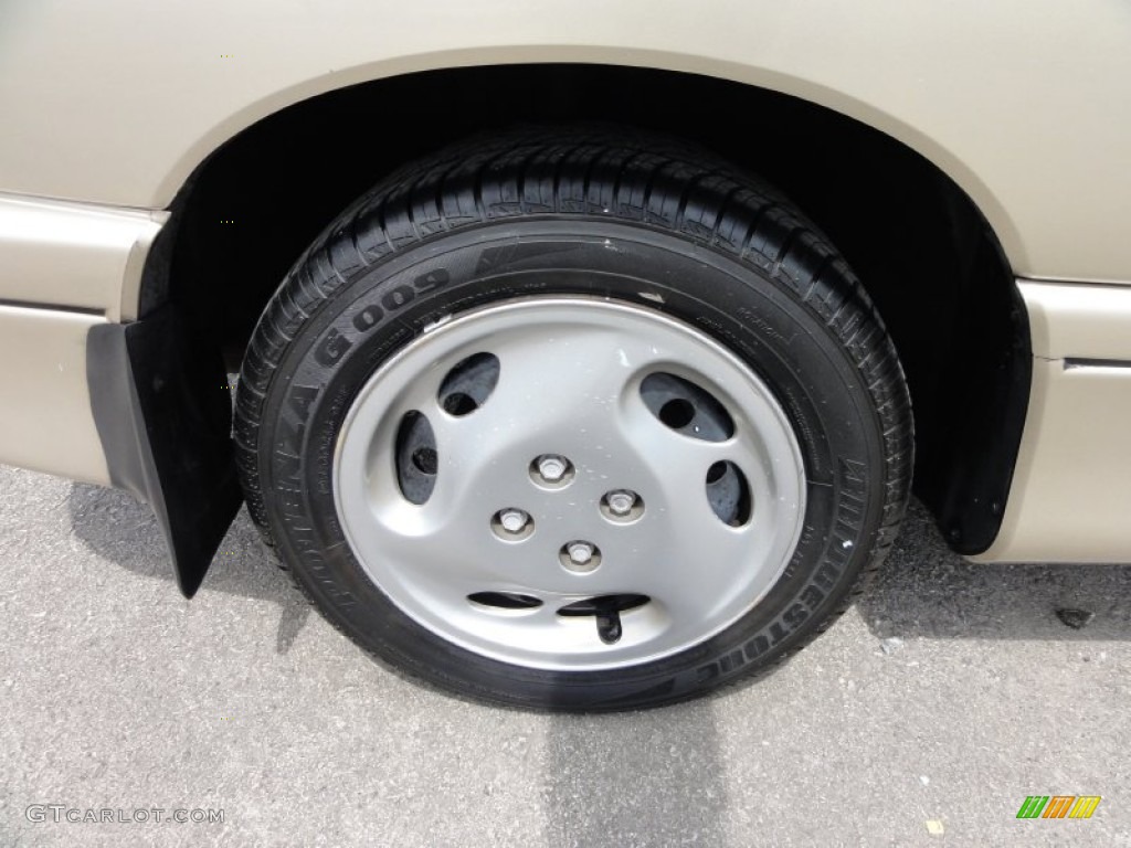 1996 Saturn S Series SC2 Coupe Wheel Photo #50625381