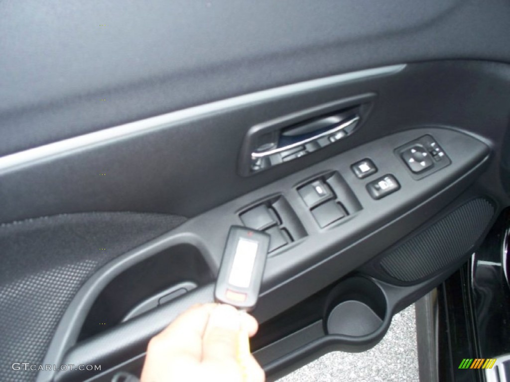 2011 Mitsubishi Outlander Sport SE 4WD Controls Photo #50628186