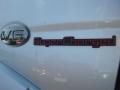 2004 Nissan Frontier SC Crew Cab 4x4 Badge and Logo Photo