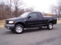 2000 Black Ford F150 XLT Extended Cab 4x4  photo #2