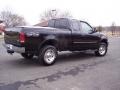 2000 Black Ford F150 XLT Extended Cab 4x4  photo #10