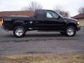 2000 Black Ford F150 XLT Extended Cab 4x4  photo #11