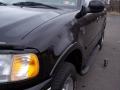2000 Black Ford F150 XLT Extended Cab 4x4  photo #40