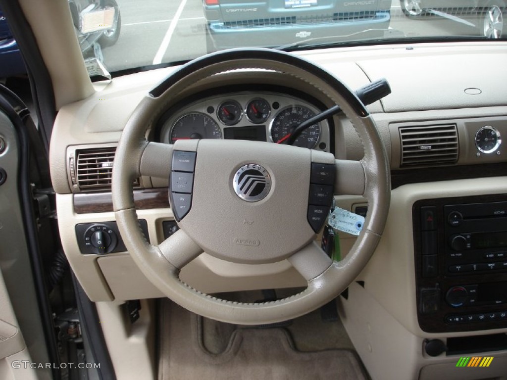 2006 Mercury Monterey Luxury Pebble/Light Parchment Steering Wheel Photo #50666552