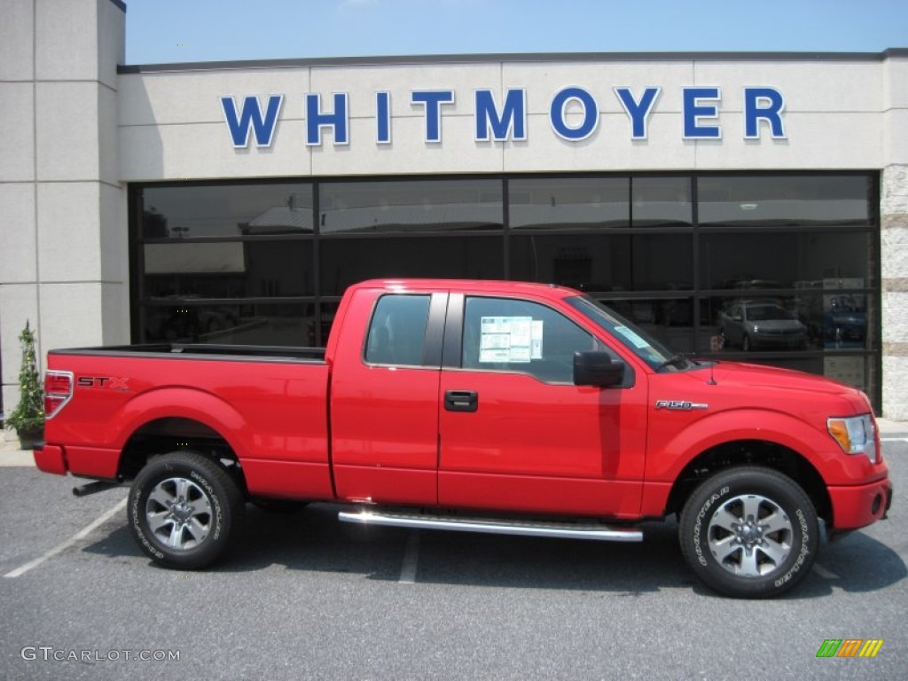 2011 F150 STX SuperCab 4x4 - Race Red / Steel Gray photo #1