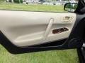 Black/Beige 2001 Chrysler Sebring LXi Coupe Door Panel