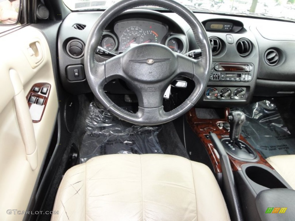 2001 Chrysler Sebring LXi Coupe Black/Beige Dashboard Photo #50711608