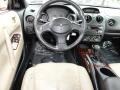2001 Chrysler Sebring Black/Beige Interior Dashboard Photo