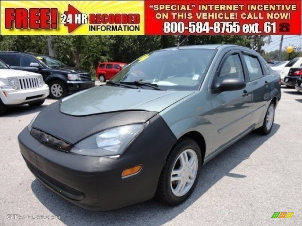 2004 Focus SE Sedan - Light Tundra Metallic / Medium Parchment photo #1