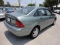 2004 Light Tundra Metallic Ford Focus SE Sedan  photo #10