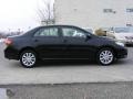 2009 Black Sand Pearl Toyota Corolla LE  photo #18