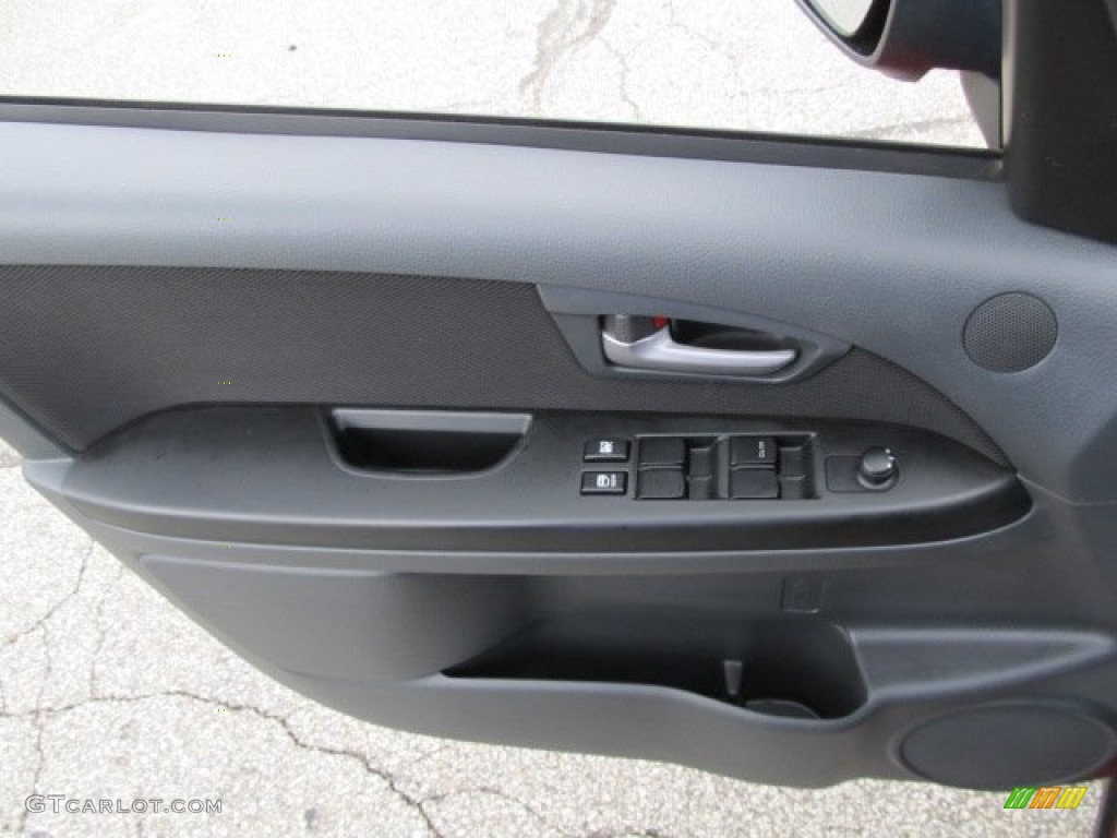 2009 Suzuki SX4 Crossover Technology AWD Black Door Panel Photo #50736759