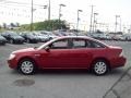 2009 Sangria Red Metallic Ford Taurus SE  photo #2