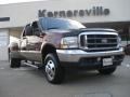 2004 Dark Toreador Red Metallic Ford F350 Super Duty Lariat Crew Cab 4x4 Dually  photo #1