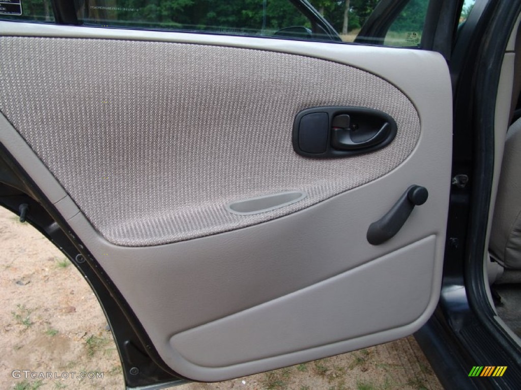1997 Saturn S Series SL Sedan Tan Door Panel Photo #50781915