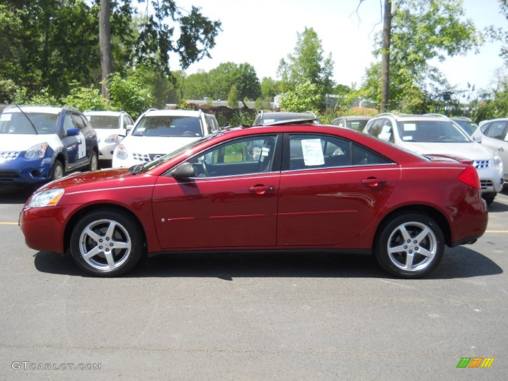 2009 G6 V6 Sedan - Performance Red Metallic / Ebony photo #15