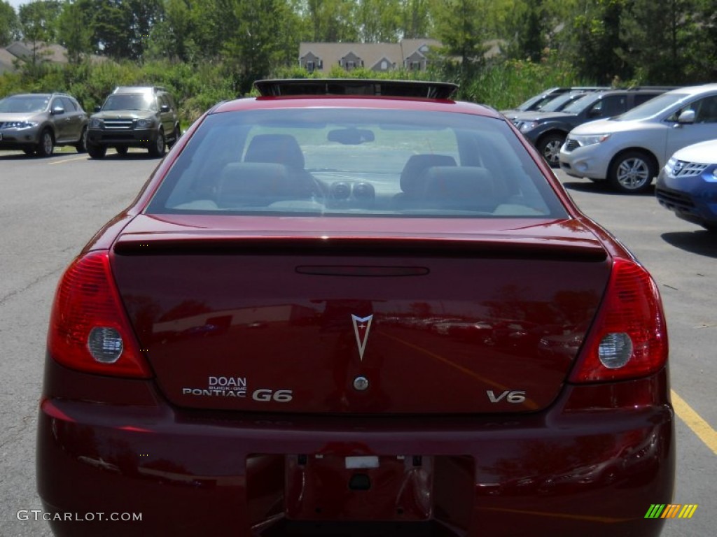 2009 G6 V6 Sedan - Performance Red Metallic / Ebony photo #17