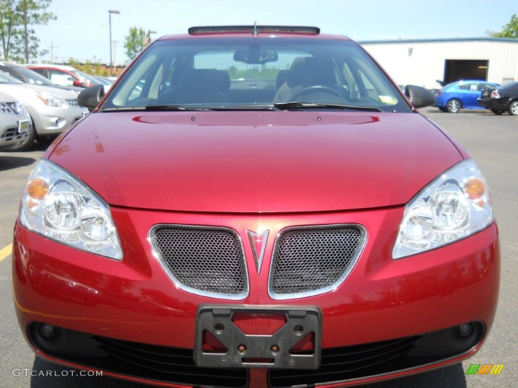 2009 G6 V6 Sedan - Performance Red Metallic / Ebony photo #19