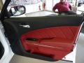 2011 Dodge Charger Black/Radar Red Interior Door Panel Photo