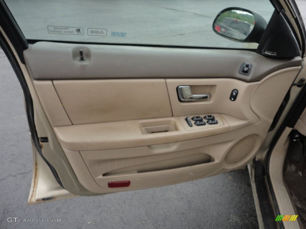 2000 Ford Taurus SEL Medium Parchment Door Panel Photo #50830125