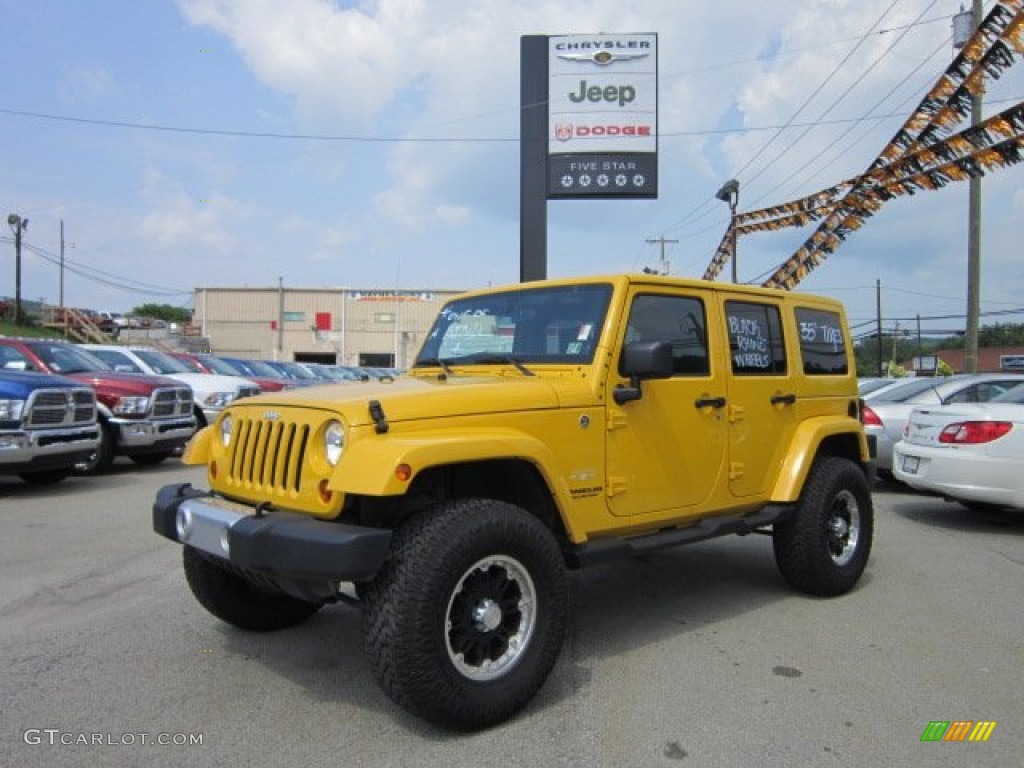 2011 Wrangler Unlimited Sahara 4x4 - Detonator Yellow / Black photo #1