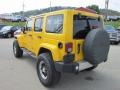 2011 Detonator Yellow Jeep Wrangler Unlimited Sahara 4x4  photo #3