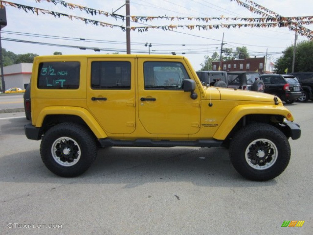 2011 Wrangler Unlimited Sahara 4x4 - Detonator Yellow / Black photo #6