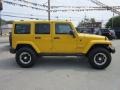 2011 Detonator Yellow Jeep Wrangler Unlimited Sahara 4x4  photo #6