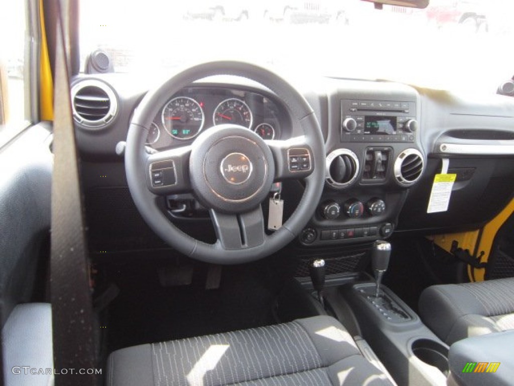 2011 Wrangler Unlimited Sahara 4x4 - Detonator Yellow / Black photo #14