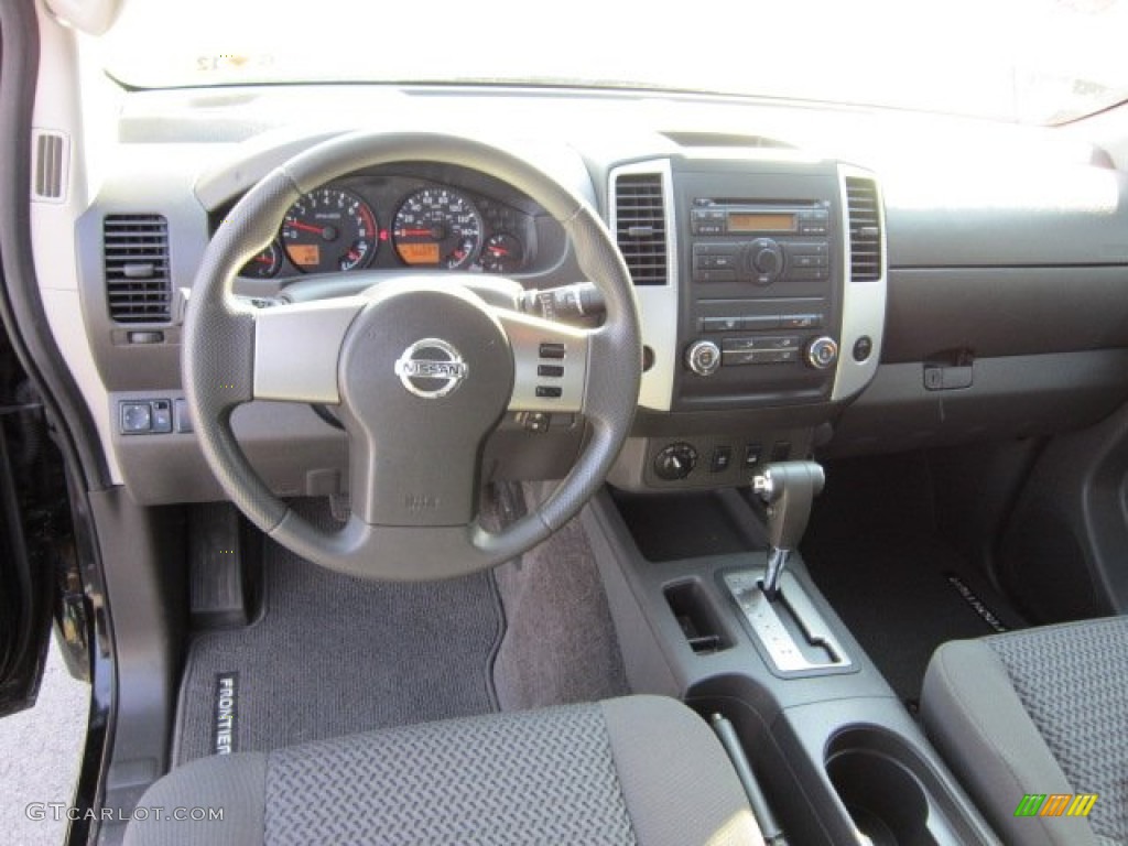 2010 Nissan Frontier SE V6 King Cab 4x4 Graphite Dashboard Photo #50869736