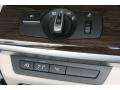 Oyster/Black Controls Photo for 2012 BMW 7 Series #50878954
