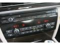 Oyster/Black Controls Photo for 2012 BMW 7 Series #50879278