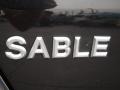  2009 Sable Sedan Logo