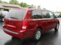 2011 Claret Red Kia Sedona LX  photo #2