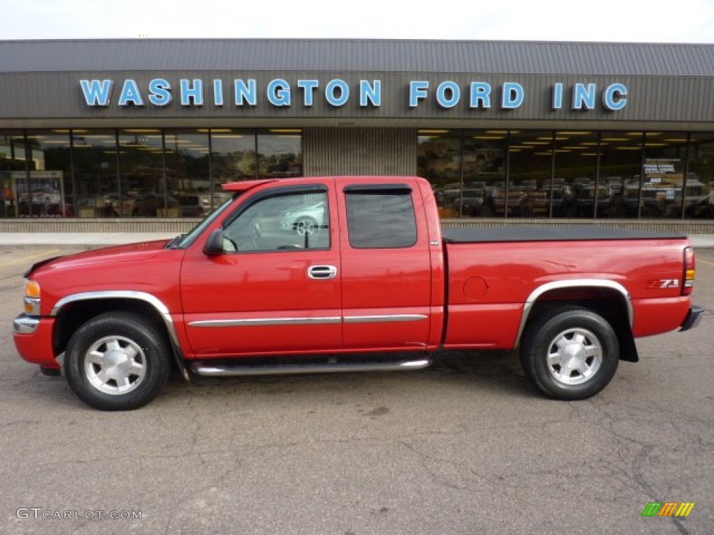 2006 Sierra 1500 SLE Extended Cab 4x4 - Fire Red / Dark Pewter photo #1