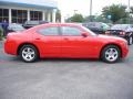 2010 TorRed Dodge Charger SXT  photo #7