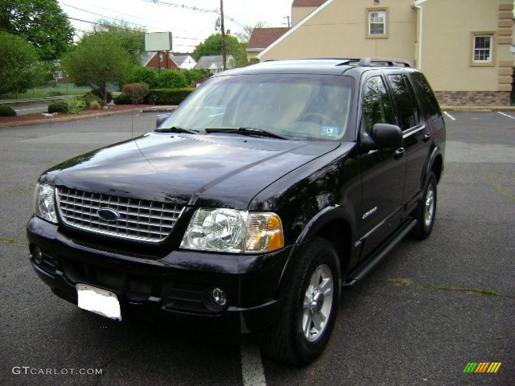 2002 Explorer Limited 4x4 - Black Clearcoat / Medium Parchment photo #3