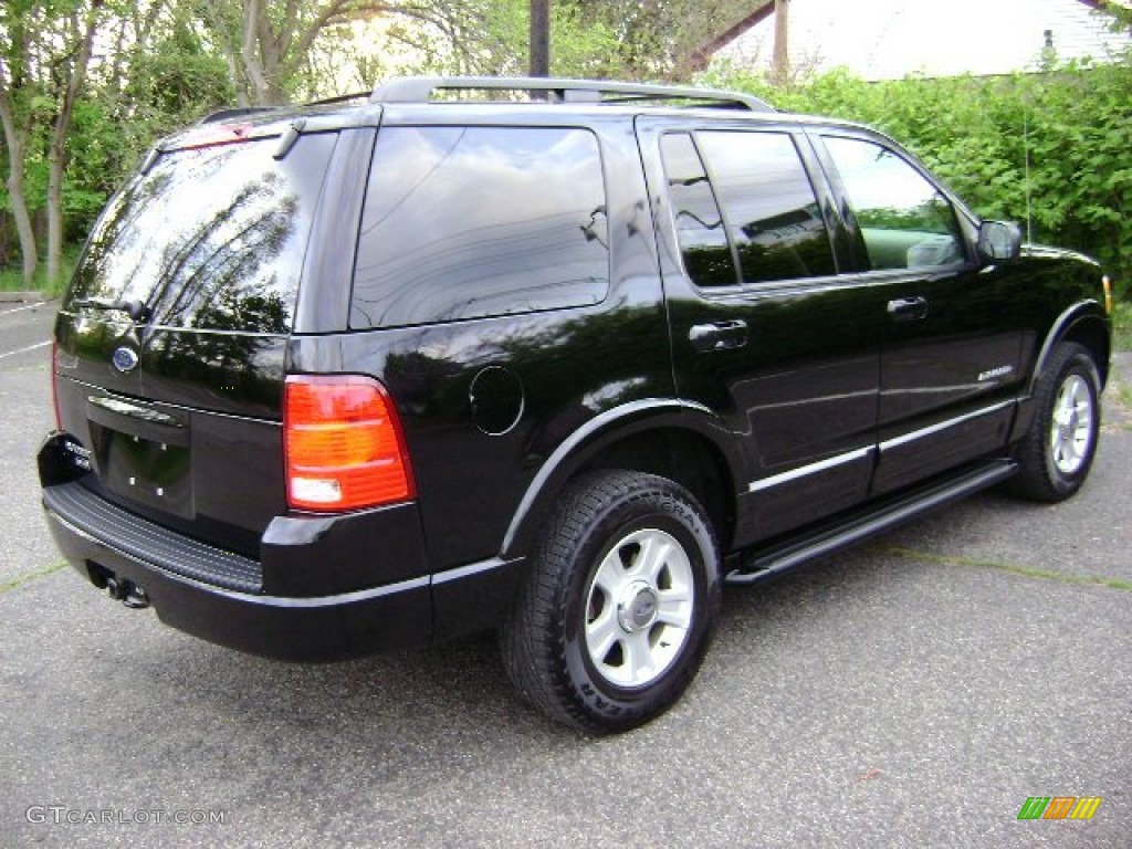 2002 Explorer Limited 4x4 - Black Clearcoat / Medium Parchment photo #5