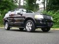 2003 Black Ford Explorer Limited 4x4  photo #30