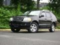 2003 Black Ford Explorer Limited 4x4  photo #33