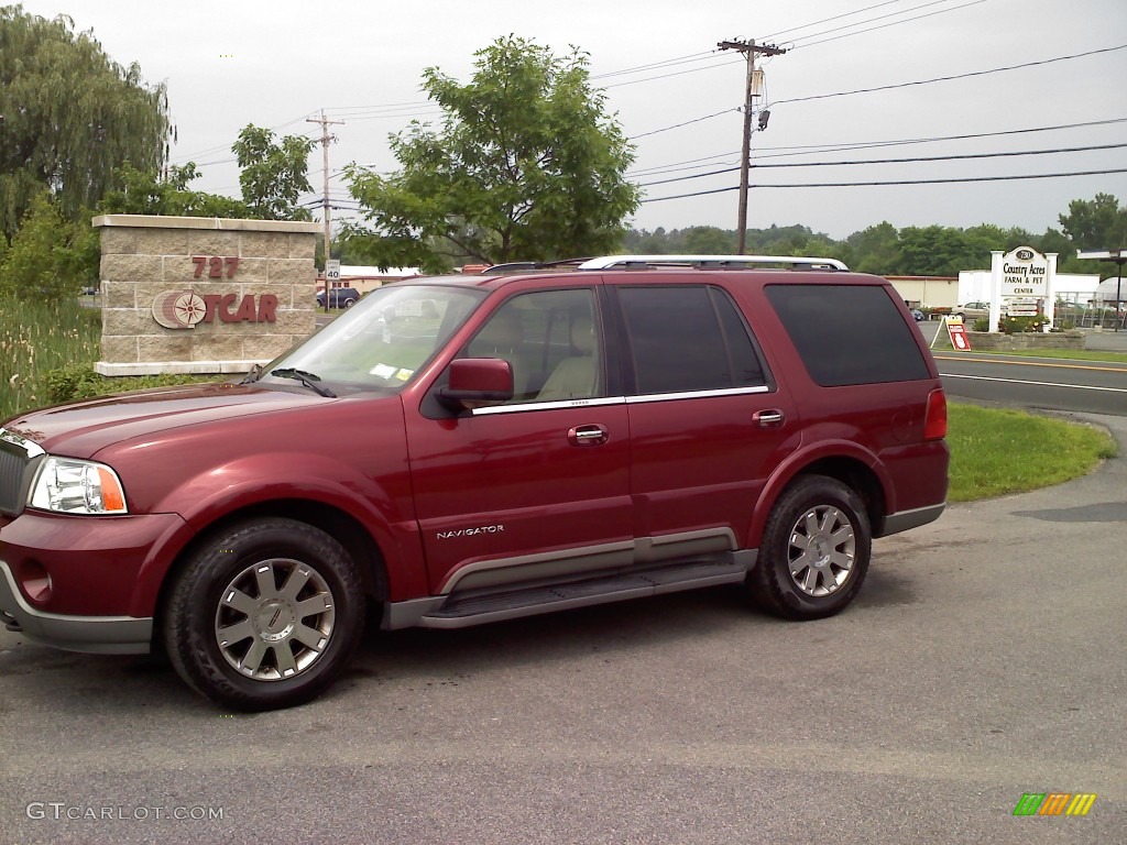 2004 Navigator Luxury 4x4 - Merlot Red Metallic / Light Parchment photo #1