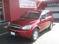 2009 Spicy Red Kia Sorento LX  photo #1