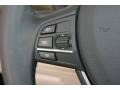 Oyster/Black Controls Photo for 2012 BMW 7 Series #51078059