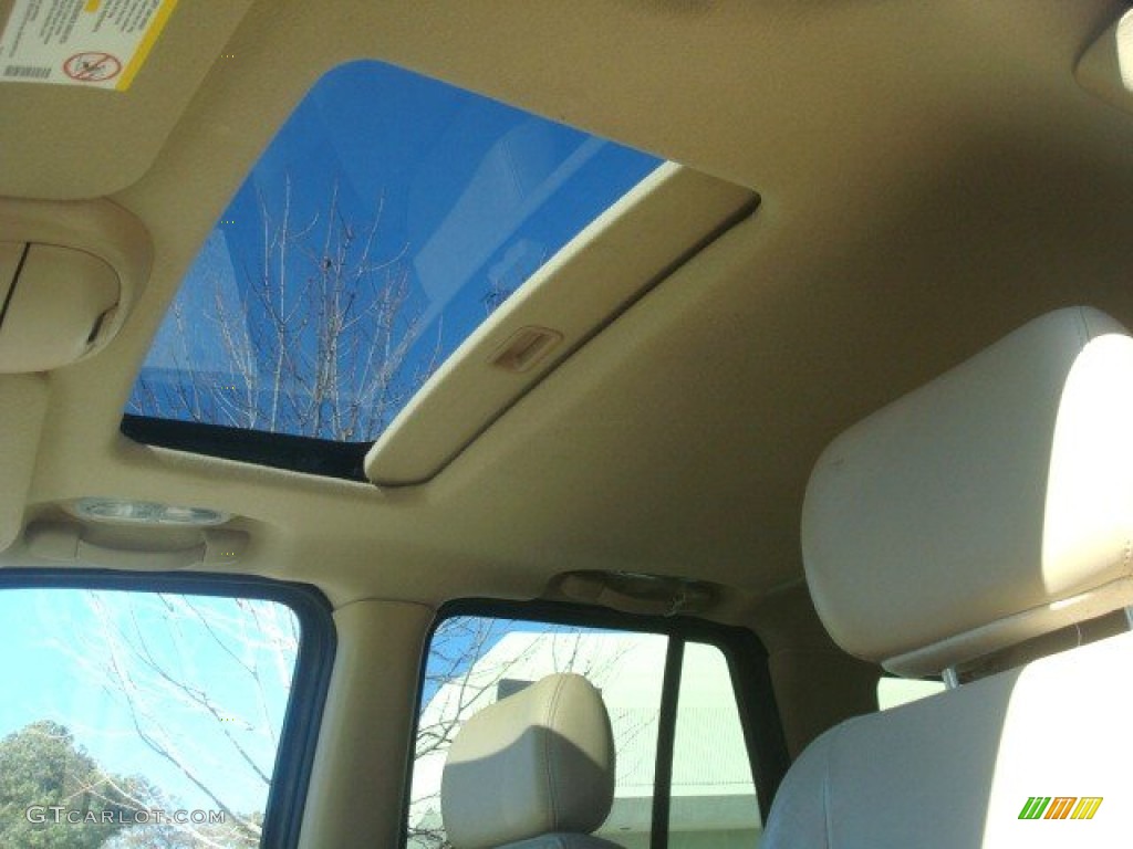 2004 Rainier CXL AWD - Indigo Blue Metallic / Light Cashmere photo #10