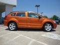 2011 Mango Tango Pearl Dodge Caliber Mainstreet  photo #2