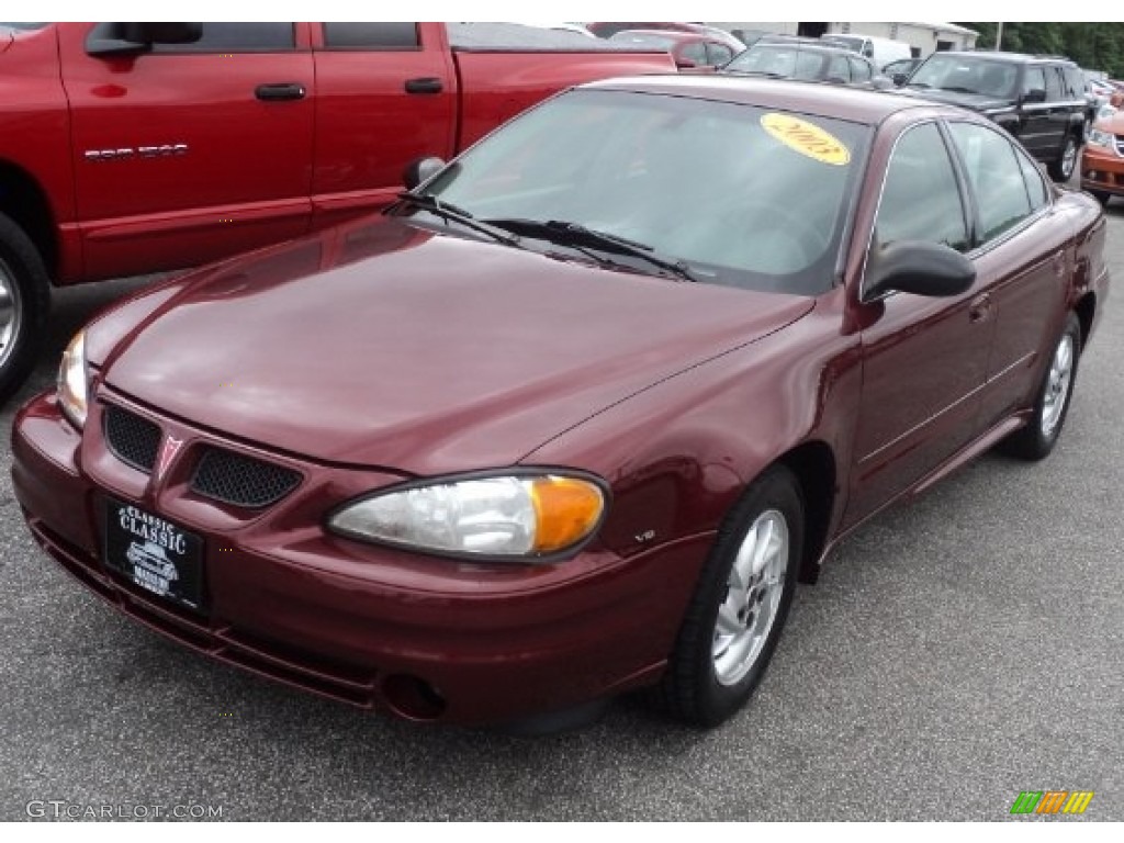 2003 Grand Am SE Sedan - Redfire Metallic / Dark Pewter photo #1