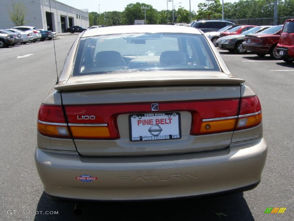 2002 L Series L100 Sedan - Medium Gold / Medium Tan photo #6